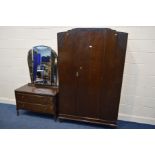 AN EARLY TO MID 20TH CENTURY OAK TWO PIECE BEDROOM SUITE, comprising a single door wardrobe and a