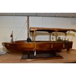A SCRATCH BUILT MODEL STEAM CRUISER, with captain figure and nameplate 'Ben', on wooden plinth,