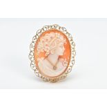 A MODERN 18CT GOLD HABILLE CAMEO BROOCH/PENDANT, of oval design, depicting a lady in profile wearing