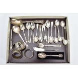 A SELECTION OF SILVER CUTLERY AND NAPKIN RINGS, to include a quantity of tea spoons, a fish knife, a