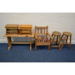 A PINE TWO SEAT STOOL, two milking stools, pine child's armchair and two circular stools (6)