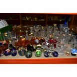 A GROUP OF GLASSWARE, including modern paperweights, orange carnival glass bowls, Stuart Crystal