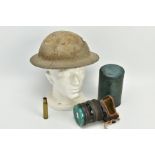 A BRITISH WWI ERA STEEL HELMET, complete with lining chin strap etc, no maker marks evident, a