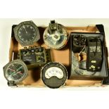 A BOX OF MILITARY ISSUE INSTRUMENTS AND DEVICES, GUAGES ETC, to include U.S Reflector sight, glide