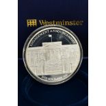 A CASED PRINCE WILLIAM AND CATHERINE MIDDLETON COMMEMORATIVE ENGAGEMENT COIN, dated 16th November