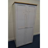 A MODERN WHITE PAINTED AND PINE DOUBLE DOOR WARDROBE, width 88cm x depth 63cm x height 188cm