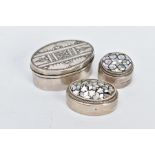 TWO EGYPTIAN SILVER PILL BOXES AND A WHITE METAL TRINKET BOX, two pill boxes of a circular and
