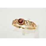 A 9CT GOLD GARNET SINGLE STONE RING WITH CELTIC DESIGN SHOULDERS, ring size P, hallmarked 9ct