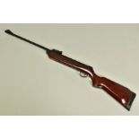 A .22'' B.S.A. METEOR MK IV AIR RIFLE, serial number TG11797, its action and barrel have a black
