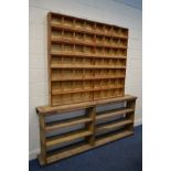 A DISTRESSED OPEN BOOKCASE/SHELVING, depth 30cm x height 92cm x length 212cm with a later pigeon