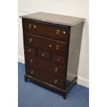 A TALL STAG MINSTREL CHEST OF THREE SHORT AND FOUR LONG DRAWERS, width 82cm x depth 47cm x height