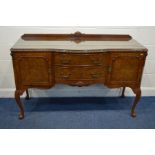 A REPRODUCTION BURR WALNUT AND MAHOGANY SIDEBOARD, two cupboard doors enclosing a cutlery drawer,