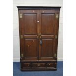 A LARGE GEORGE III OAK FREE STANDING TWO SECTION CORNER CUPBOARD, with double fielded panel doors