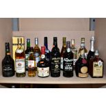 ALCOHOL, a collection of seventeen bottles of Wine and Spirit including Remy Martin VS Grand Cru