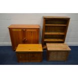 FOUR VARIOUS PINE FURNITURE ITEMS, to include a two door cupboard, open bookcase and two blanket