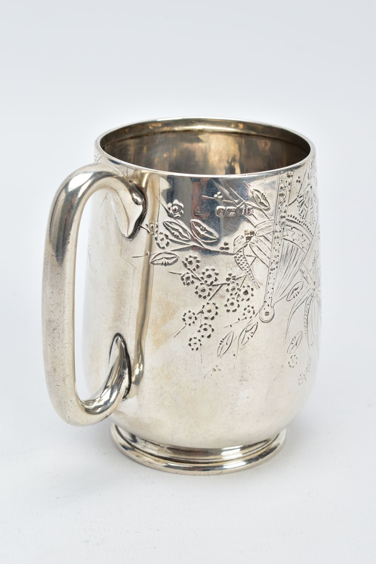 A VICTORIAN SILVER MUG, with a floral and foliate engraved design body, plain polished handle, on - Image 3 of 5