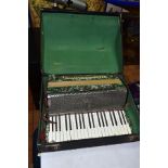 AN ALVARI ACCORDIAN IN CASE, in need of attention