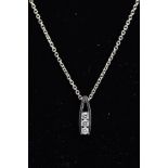 AN 18CT WHITE GOLD DIAMOND PENDANT NECKLACE, the pendant of an openwork drop design, set with