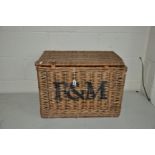 A FORTNAM AND MASON HAMPER with leather straps and wicker handles, width 60cm x depth 40cm x