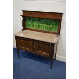 AN EDWARDIAN MAHOGANY MARBLE TOP WASHSTAND with a green tile raised back, width 107cm x depth 49cm x