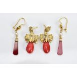 TWO PAIRS OF YELLOW METAL DROP EARRINGS, the first pair each designed with a carved carnelian
