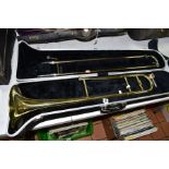 A BLESSING SCHOLASTIC TROMBONE with mouthpiece, serial no 347972