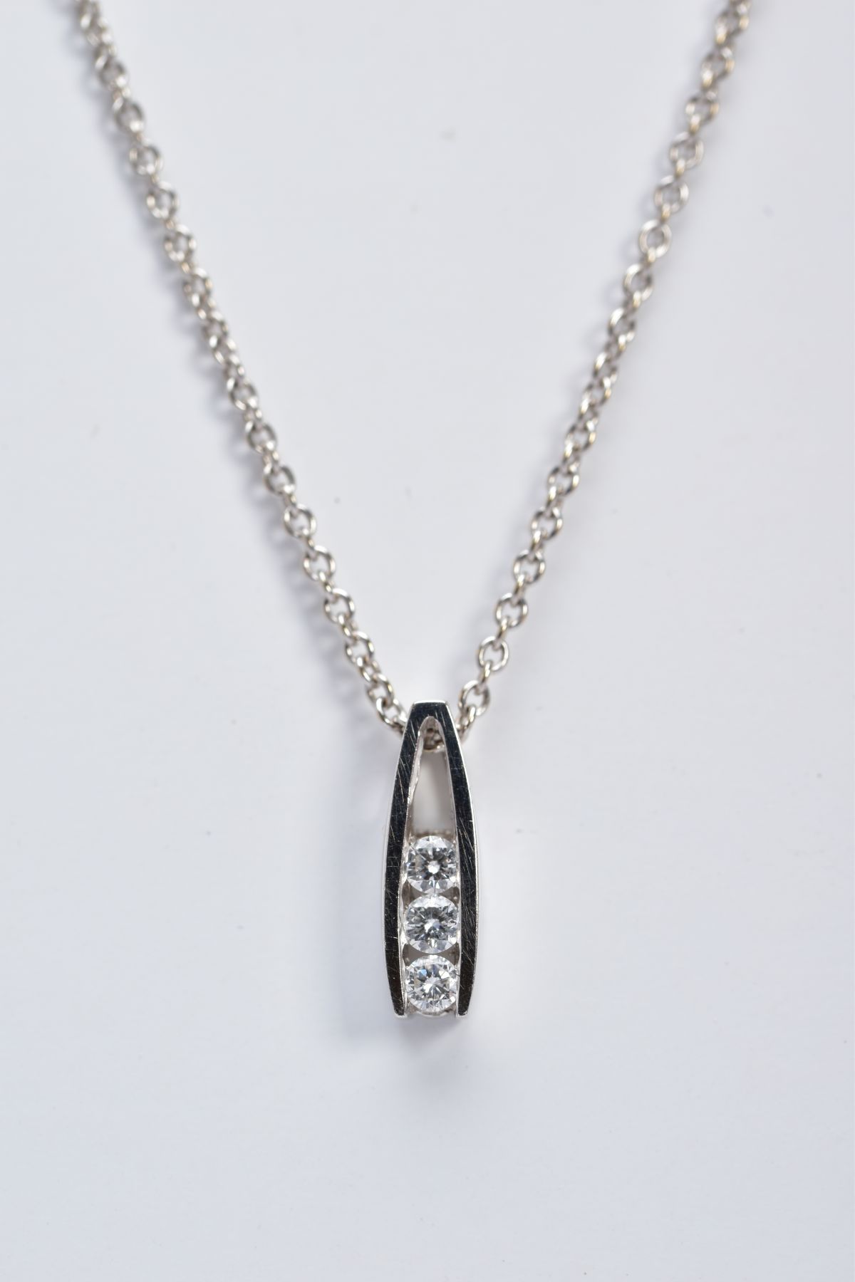 AN 18CT WHITE GOLD DIAMOND PENDANT NECKLACE, the pendant of an openwork drop design, set with - Image 2 of 2