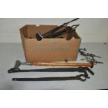 A TRAY OF BLACKSMITHS AND FARRIERS TOOLS including bits, grooming tools, etc