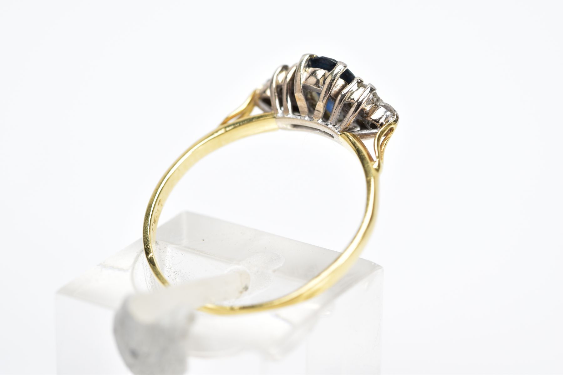 A SAPPHIRE AND DIAMOND RING, the yellow metal ring designed with an oval cut sapphire, flanked - Image 3 of 3