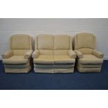 A FOLIATE GOLD UPHOLSTERED THREE PIECE LOUNGE SUITE, comprising a two seater settee, a manual
