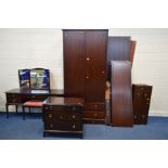 A STAG MINSTREL BEDROOM SUITE, comprising two large adjoining double door wardrobes, with two