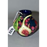 A SMALL MOORCROFT POTTERY VASE, 'Queens Choice' pattern designed by Emma Bossons, impressed