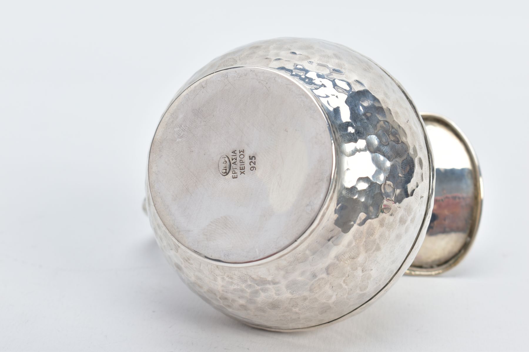 A WHITE METAL JUG, of a hammered design, scroll handle, stamped 925 to the base, approximate gross - Image 5 of 5