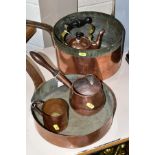 COPPER KITCHEN WARES, comprising a 25cm saucepan, 26cm frying pan, kettle with replaced bottom, milk