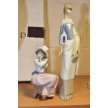 TWO NAO FIGURES, young woman holding sheaf of corn, height 30cm and 'A Big Hug' No 1049, girl