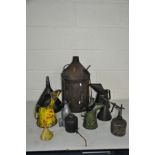 ELEVEN VINTAGE OIL AND LUBRICATION CANISTERS including a Shell and two unbranded oil jugs, two