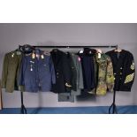 SEVEN ITEMS OF MILITARY CLOTHING including Naval dress jackets, British/U.S, German Airline/