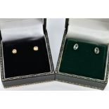 TWO PAIRS OF 9CT GOLD GEM SET EARRINGS, the first pair each designed with a round brilliant cut