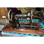 A FRISTER & ROSSMAN CAST IRON SEWING MACHINE, machine and floral decoration in fairly good