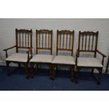 A SET OF FOUR OAK DINING CHAIRS, to include two carvers