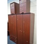 A MODERN SIX PIECE BEDROOM SUITE, comprising a double door wardrobe with two drawers below