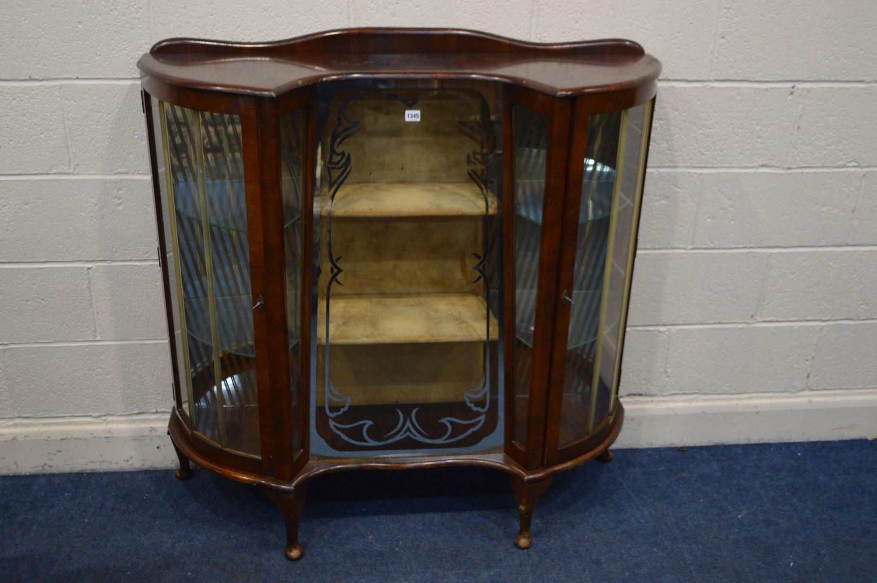 A 1940'S MAHOGANY CHINA CABINET, with a central glass front with two shelves, flanked by single