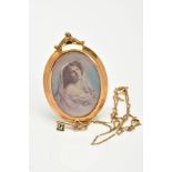 AN EARLY TO MID 20TH CENTURY GOLD BRIDAL PORTRAIT PENDANT, oval shape measuring 50mm x 35mm, back