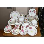 A ROYAL ALBERT 'PRAIRIE ROSE' DINNER SERVICE, comprising a tea pot, milk jug, sugar bowl, five tea
