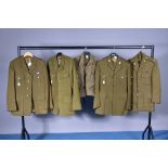 FIVE ITEMS OF BRITISH ARMY UNIFORMS, to include four dress jackets, two with matching trousers and