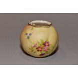 A ROYAL WORCESTER BLUSH IVORY GLOBULAR VASE, shape No G161, painted and tinted with floral sprays,