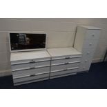 A MODERN WHITE PAINTED LOW DRESSING CHEST, with a rectangular mirror together with a matching