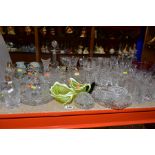 A GROUP OF GLASSWARE, including drinking glasses, bowls, grapefruit dishes, yellow and vaseline