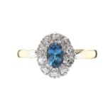 18CT GOLD DIAMOND AND SWISS BLUE TOPAZ CLUSTER RING