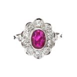 18CT WHITE GOLD RUBY AND DIAMOND CLUSTER RING